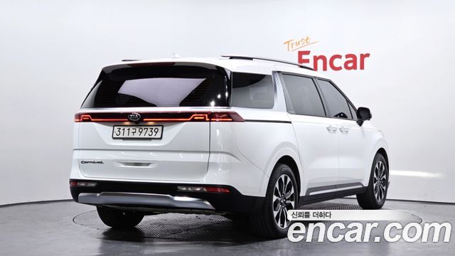 Kia Canival 2021 — photo 2
