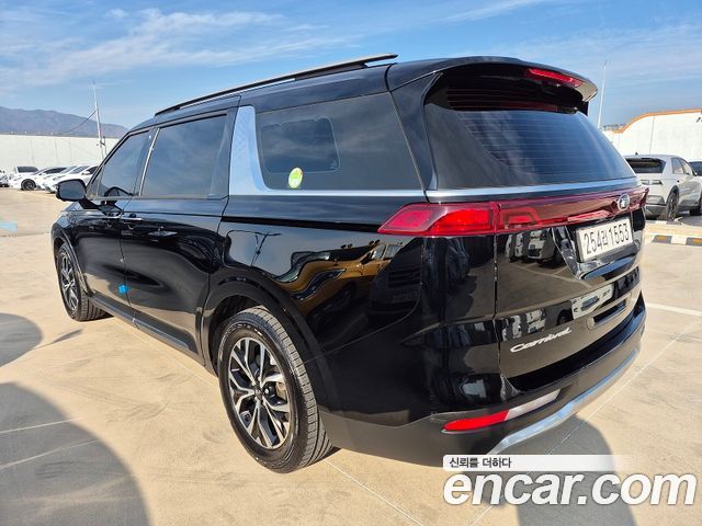 Kia Canival 2021 — photo 2
