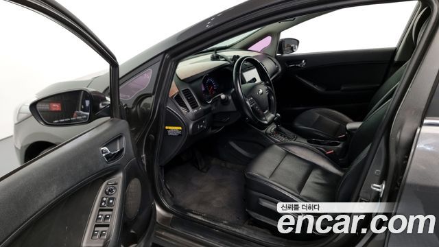 Kia K3 2013 — photo 11