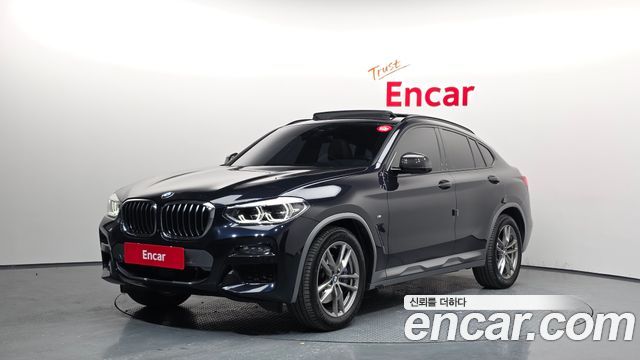 BMW X4 2021 — photo 1