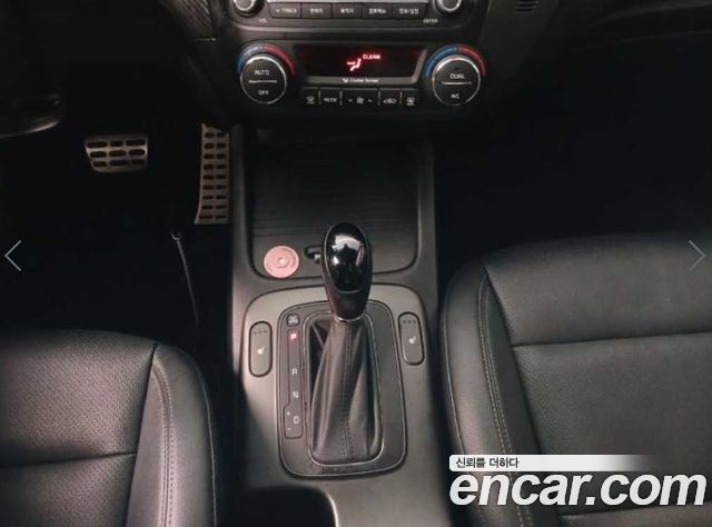 Kia K3 2013 — photo 15