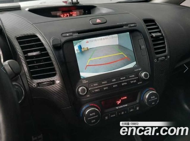 Kia K3 2013 — photo 16