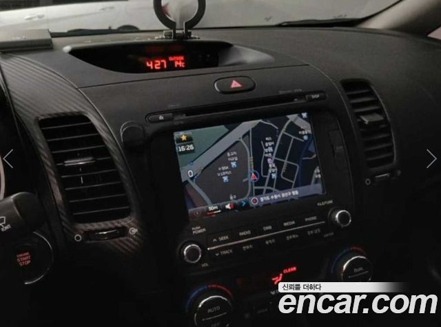 Kia K3 2013 — photo 17