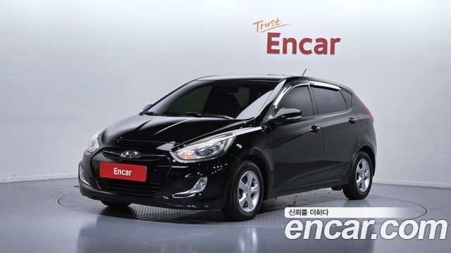 Hyundai Accent 2014 — photo 1