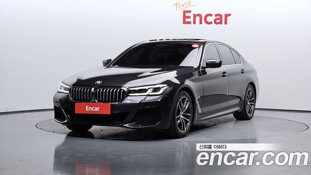 BMW 5-Series 2021 — photo 1