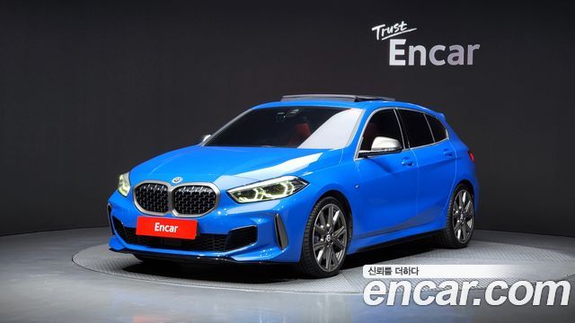 BMW 1-Series 2022 — photo 1