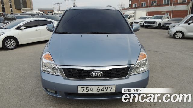 Kia Canival 2013 — photo 2