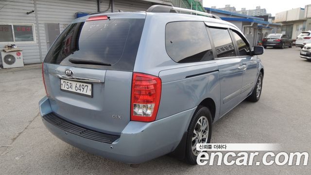 Kia Canival 2013 — photo 4