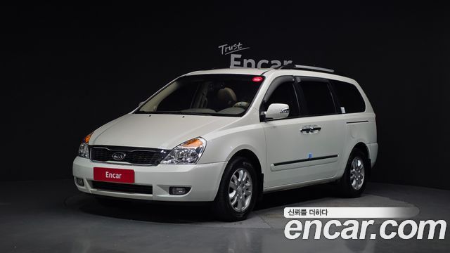 Kia Canival 2011 — photo 1