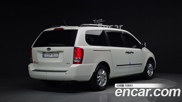 Kia Canival 2011 — photo 2