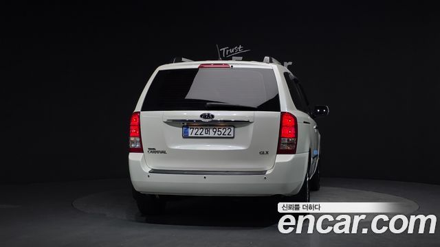 Kia Canival 2011 — photo 4