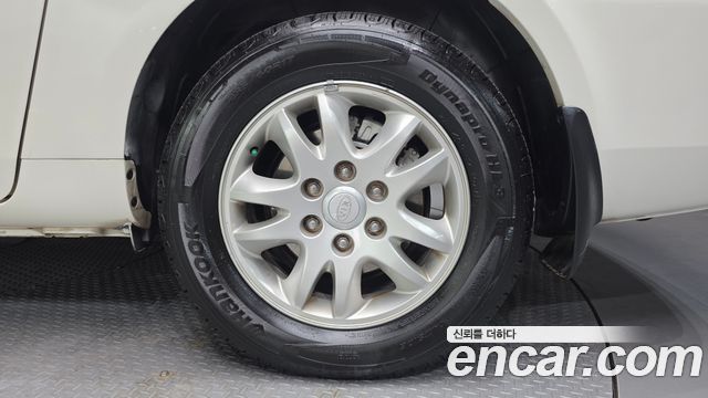 Kia Canival 2011 — photo 5