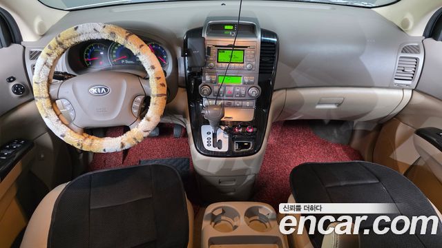 Kia Canival 2011 — photo 7