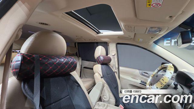 Kia Canival 2011 — photo 11