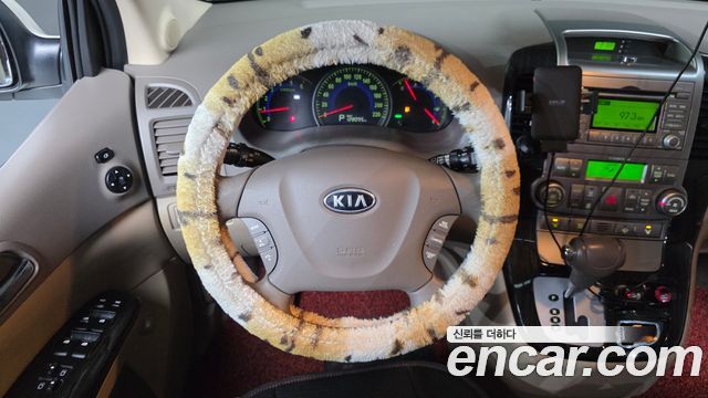 Kia Canival 2011 — photo 14