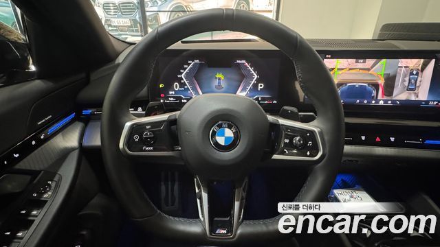 BMW 5-Series 2024 — photo 12