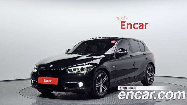 BMW 1-Series 2018 — photo 1