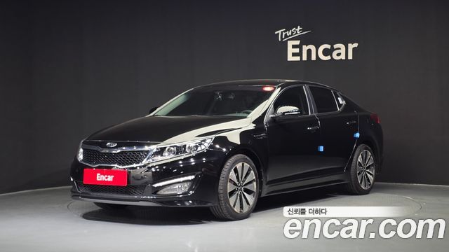 Kia K5 2011 — photo 1