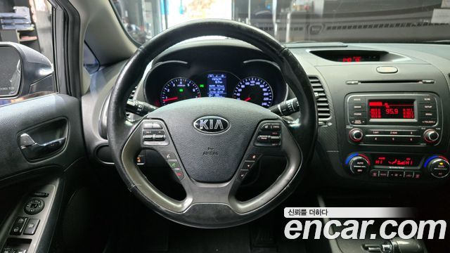 Kia K3 2015 — photo 14