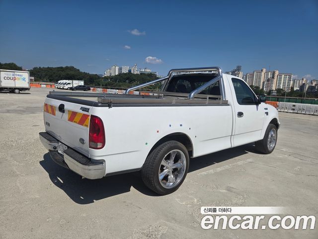 Ford F150 2000 — photo 2