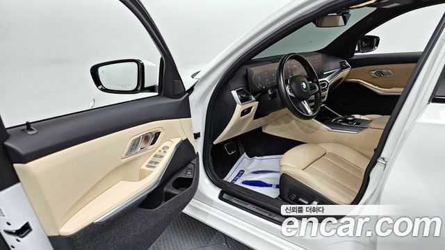 BMW 3-Series 2023 — photo 10