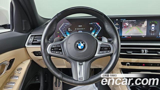 BMW 3-Series 2023 — photo 16