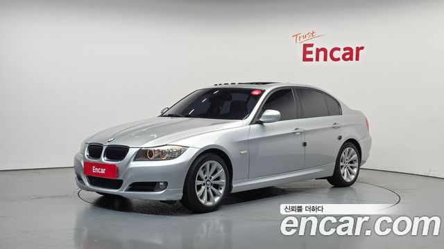 BMW 3-Series 2011 — photo 1