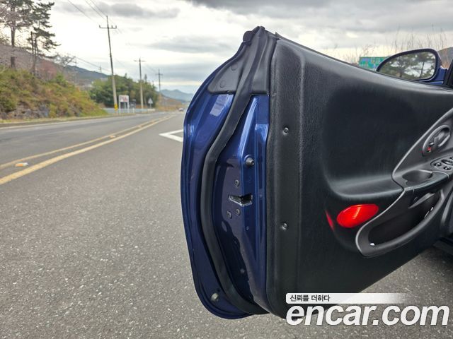Hyundai Tiburon 1999 — photo 11