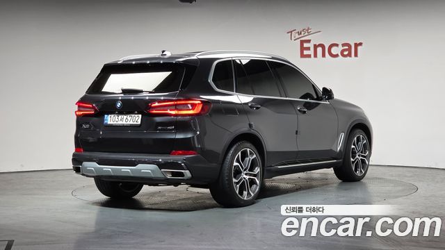 BMW X5 2022 — photo 2