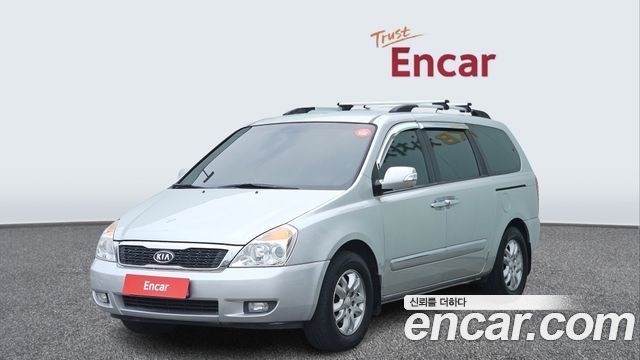 Kia Canival 2012 — photo 1
