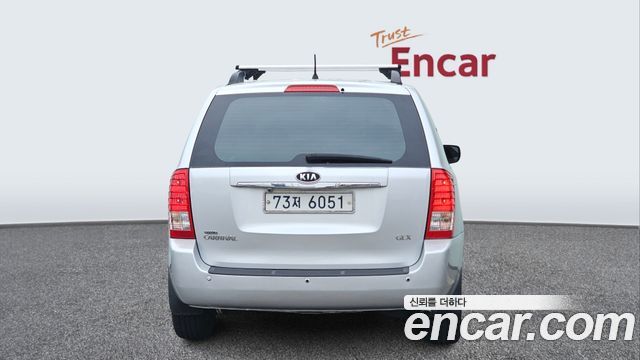 Kia Canival 2012 — photo 4