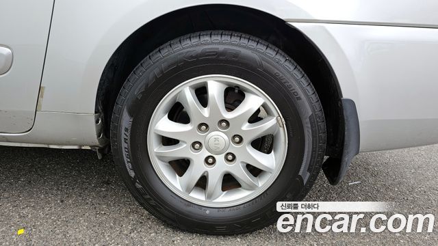 Kia Canival 2012 — photo 5