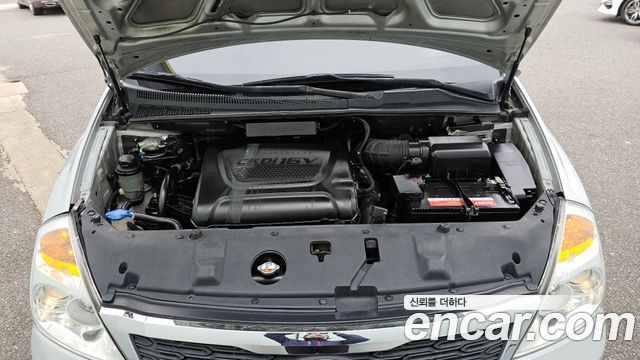 Kia Canival 2012 — photo 6