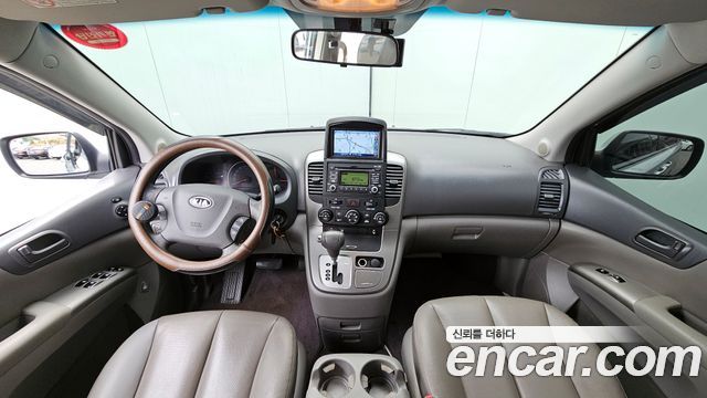 Kia Canival 2012 — photo 7