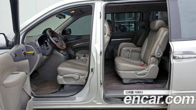 Kia Canival 2012 — photo 10