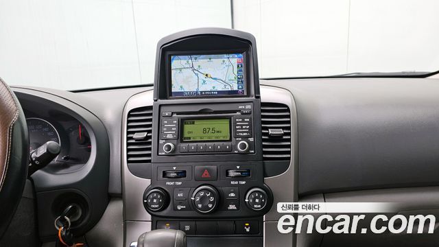 Kia Canival 2012 — photo 15