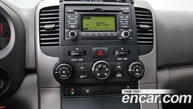 Kia Canival 2012 — photo 17