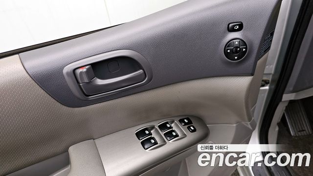 Kia Canival 2012 — photo 18