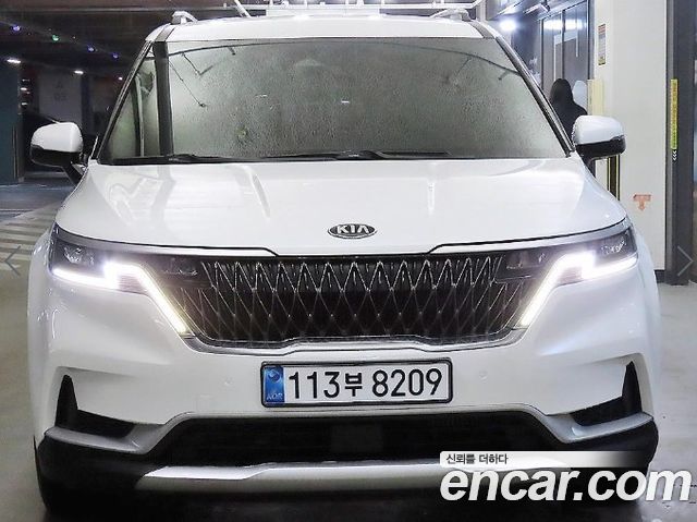 Kia Canival 2021 — photo 2