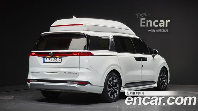 Kia Canival 2021 — photo 2