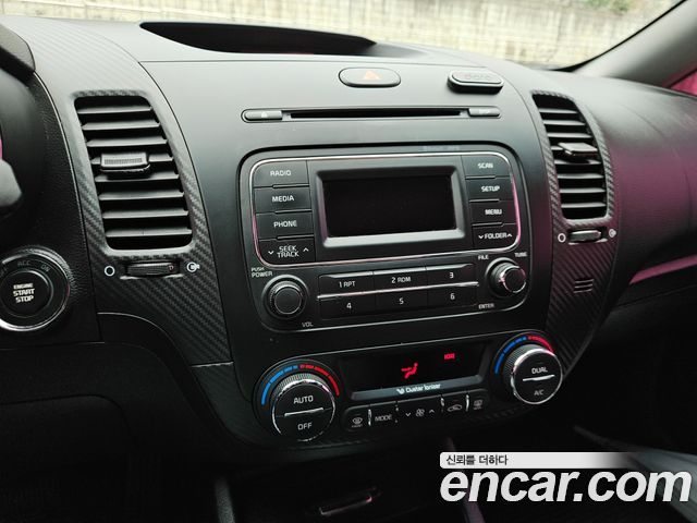 Kia K3 2015 — photo 15