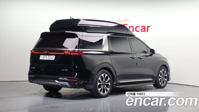 Kia Canival 2023 — photo 2