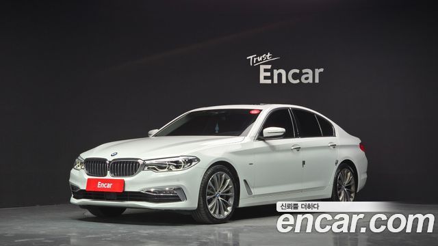 BMW 5-Series 2018 — photo 1