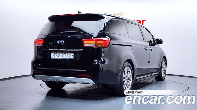 Kia Canival 2015 — photo 2