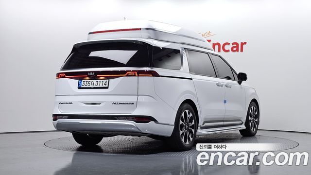 Kia Canival 2021 — photo 2