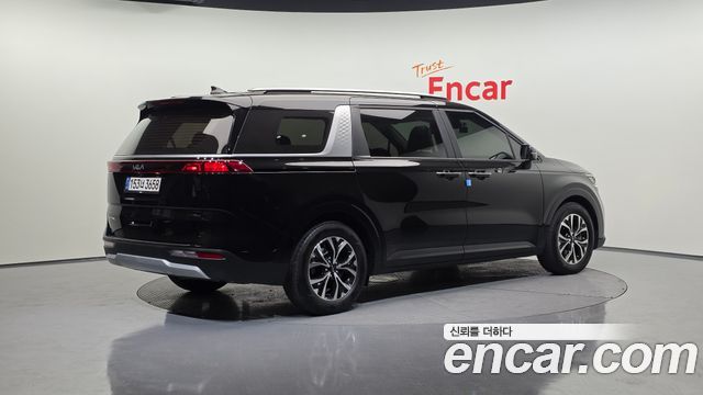 Kia Canival 2023 — photo 2