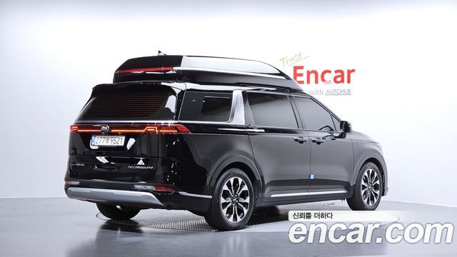 Kia Canival 2021 — photo 2