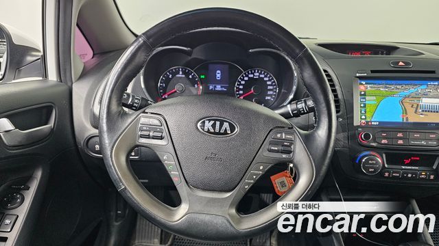 Kia K3 2015 — photo 14