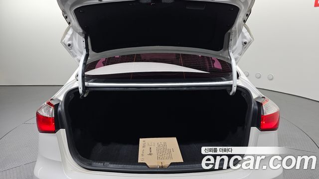 Kia K3 2015 — photo 20