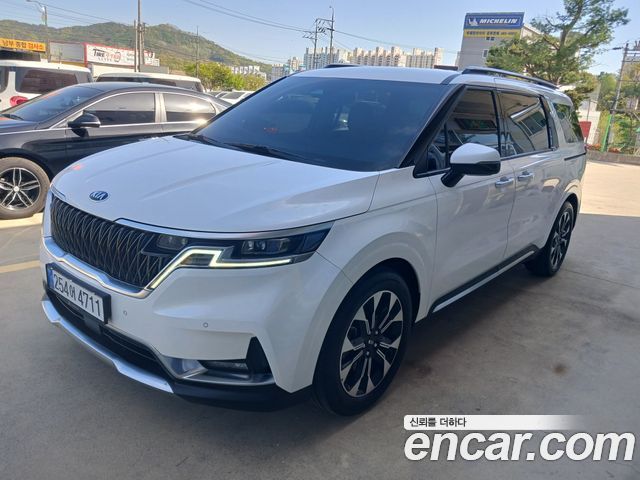 Kia Canival 2021 — photo 2